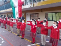 Celebación del día de la bandera, por alumnos de 3er. año